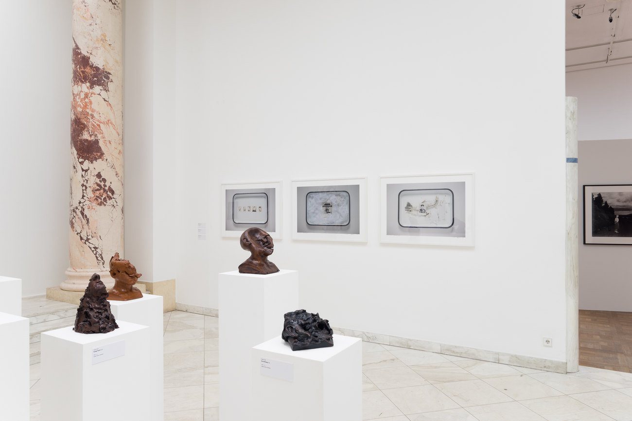 Image of a white gallery space exhibiting Gavin Turk's En Face Series