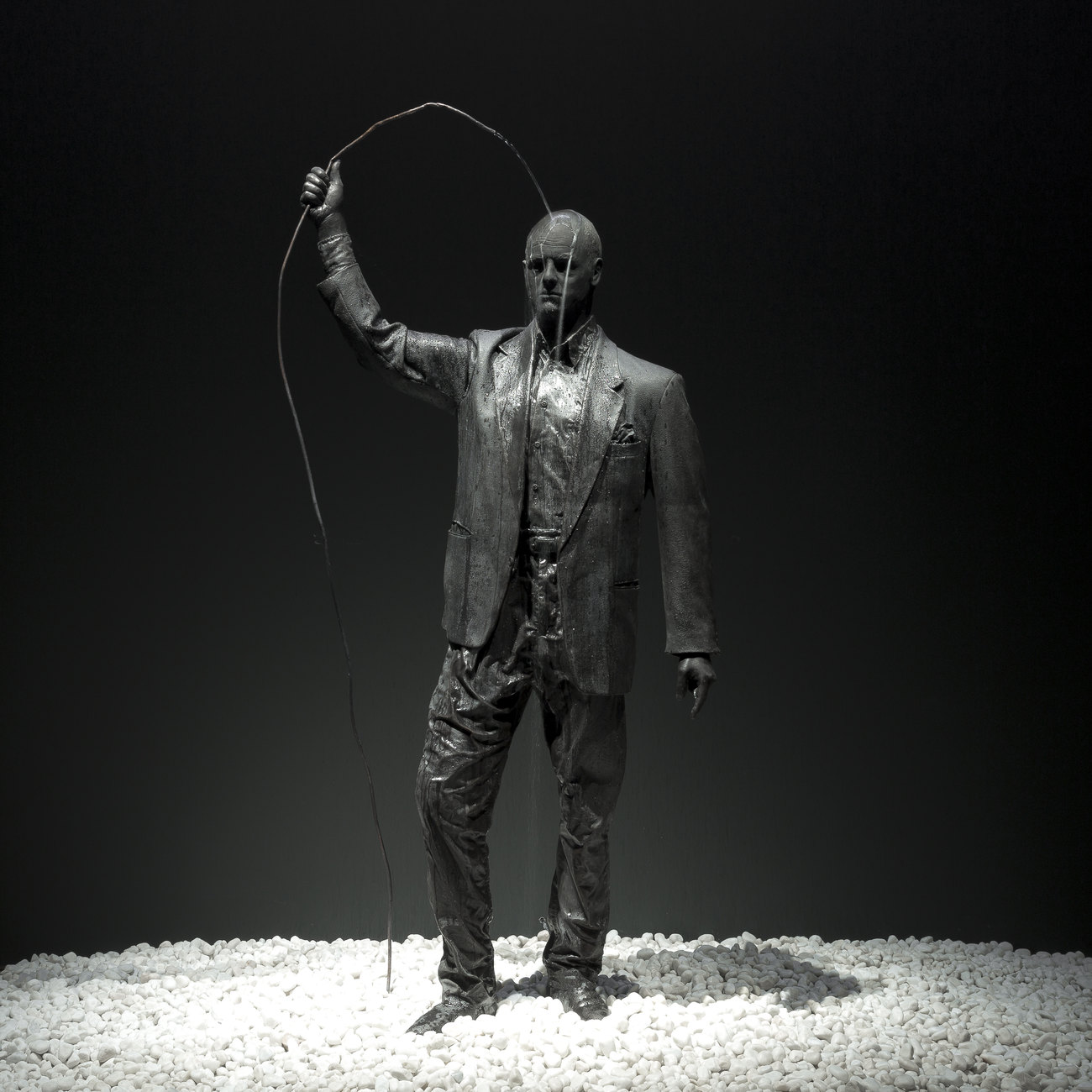 A self portrait of Gavin Turk as a Bronze statue