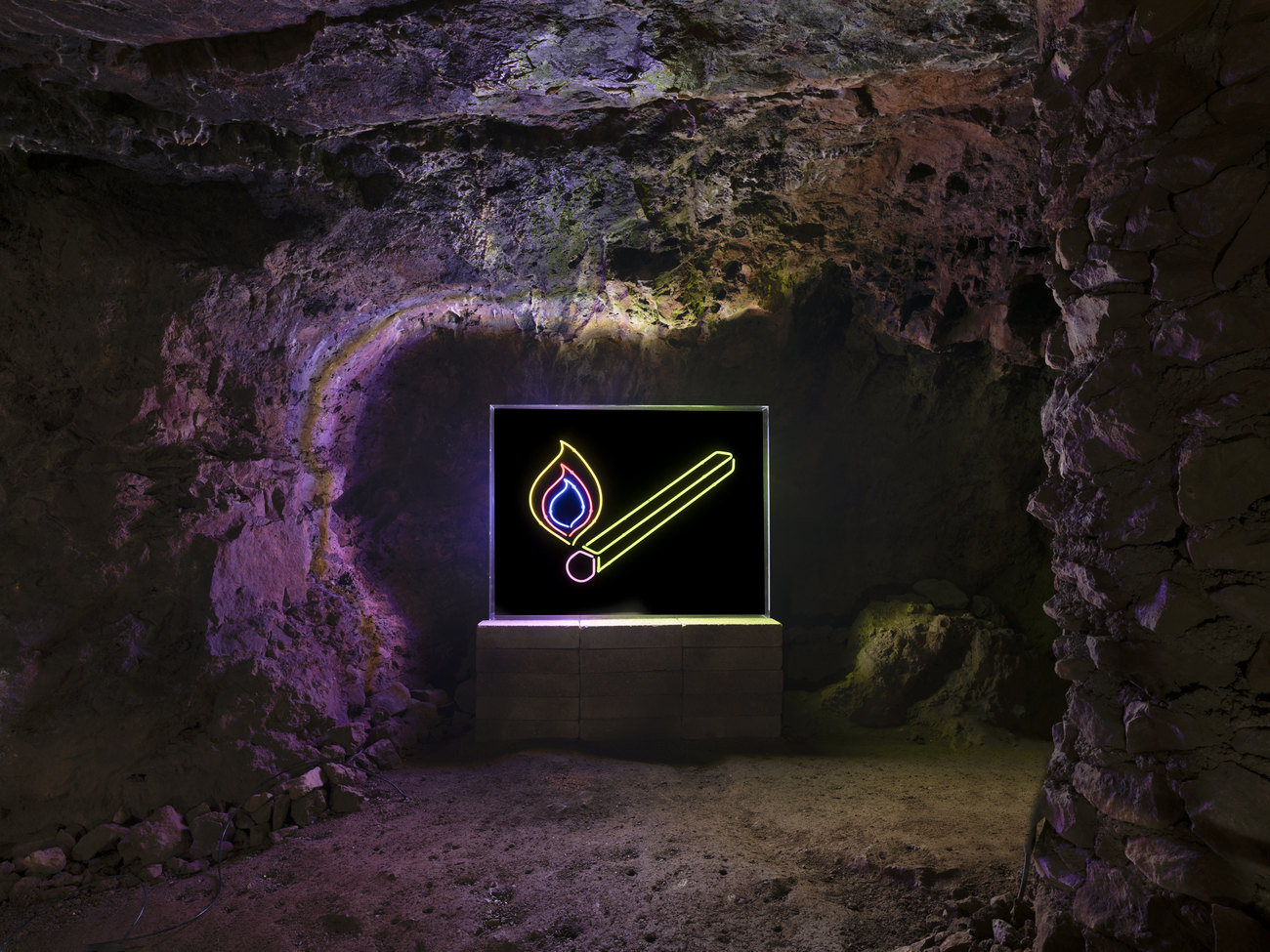 Image shows Gavin Turk Neon work of a match flashing on fire and off
