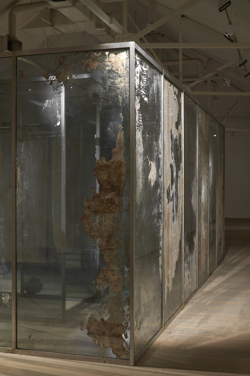 Close up of distressed mirror maze by Gavin Turk 