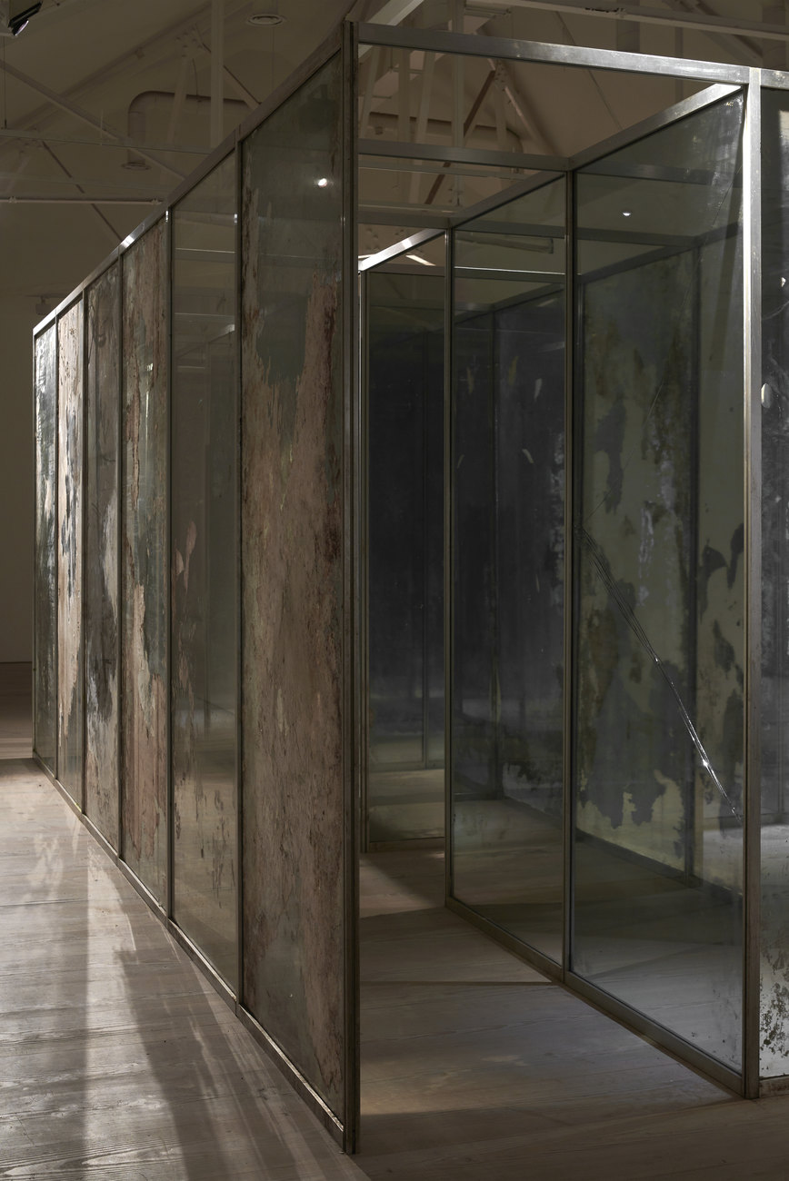 Close up of artwork of a distressed mirror maze by Gavin Turk