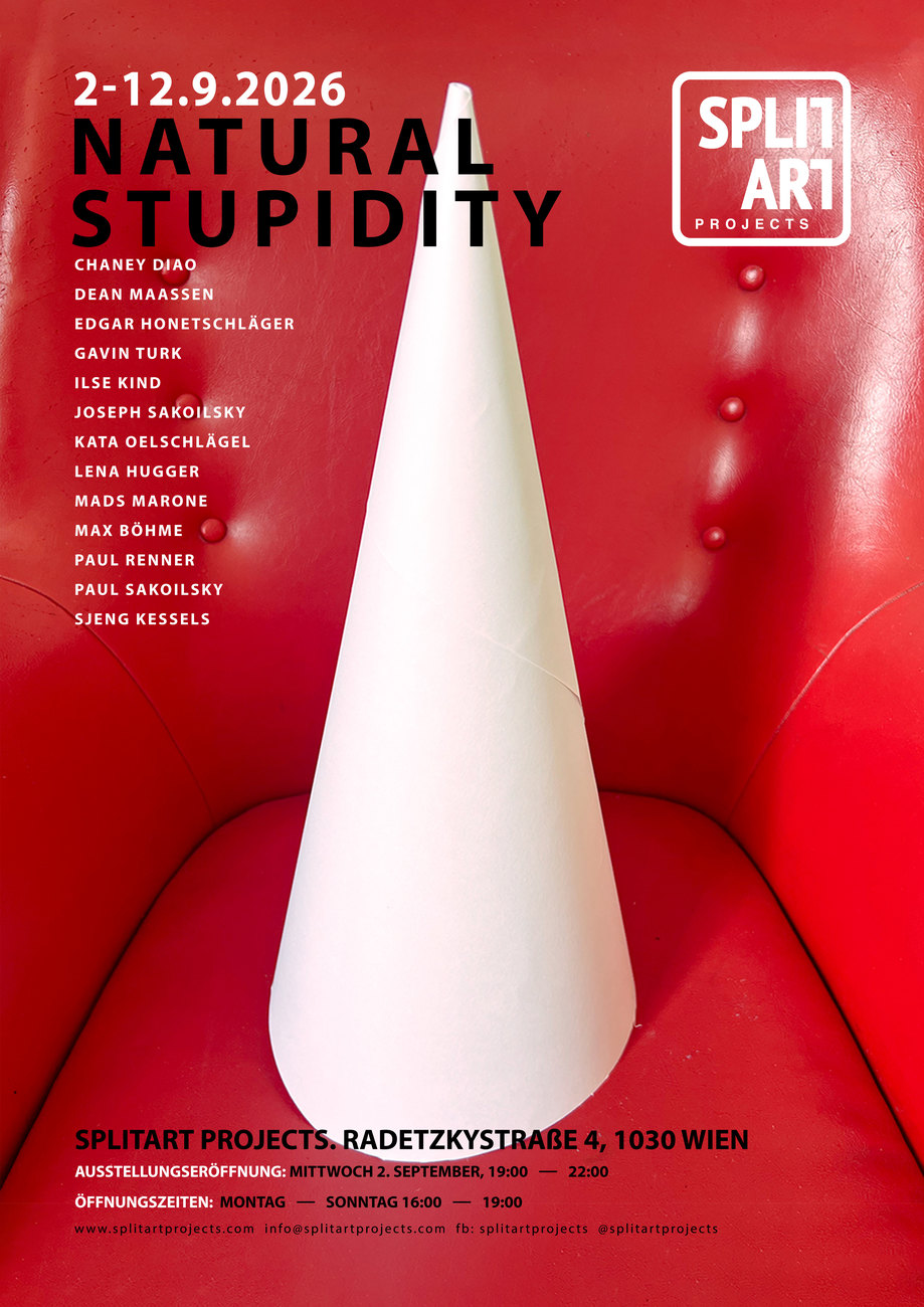 Image shows a white dunce hat on a red chair