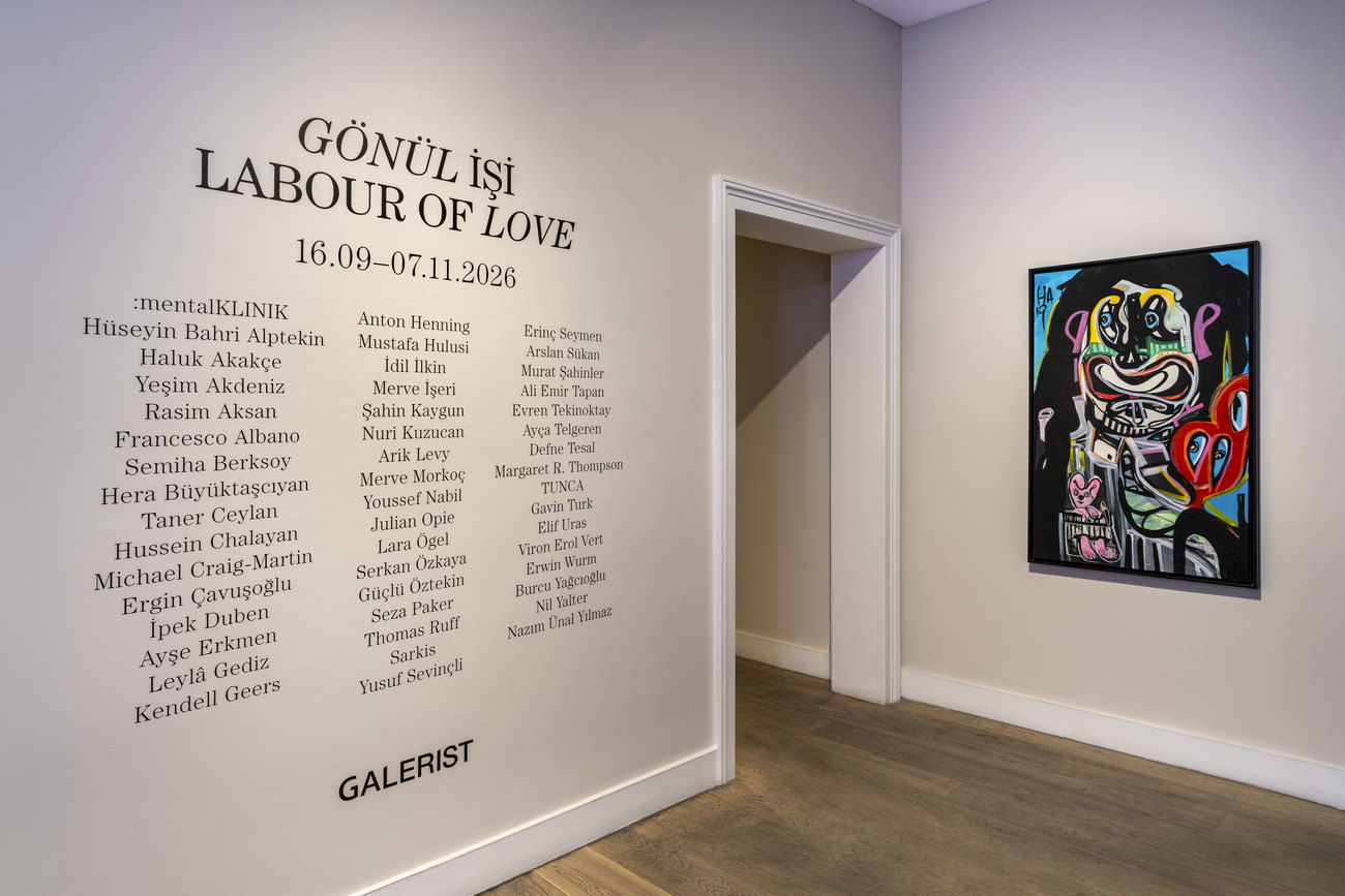 Installation shot listing the artists involved names